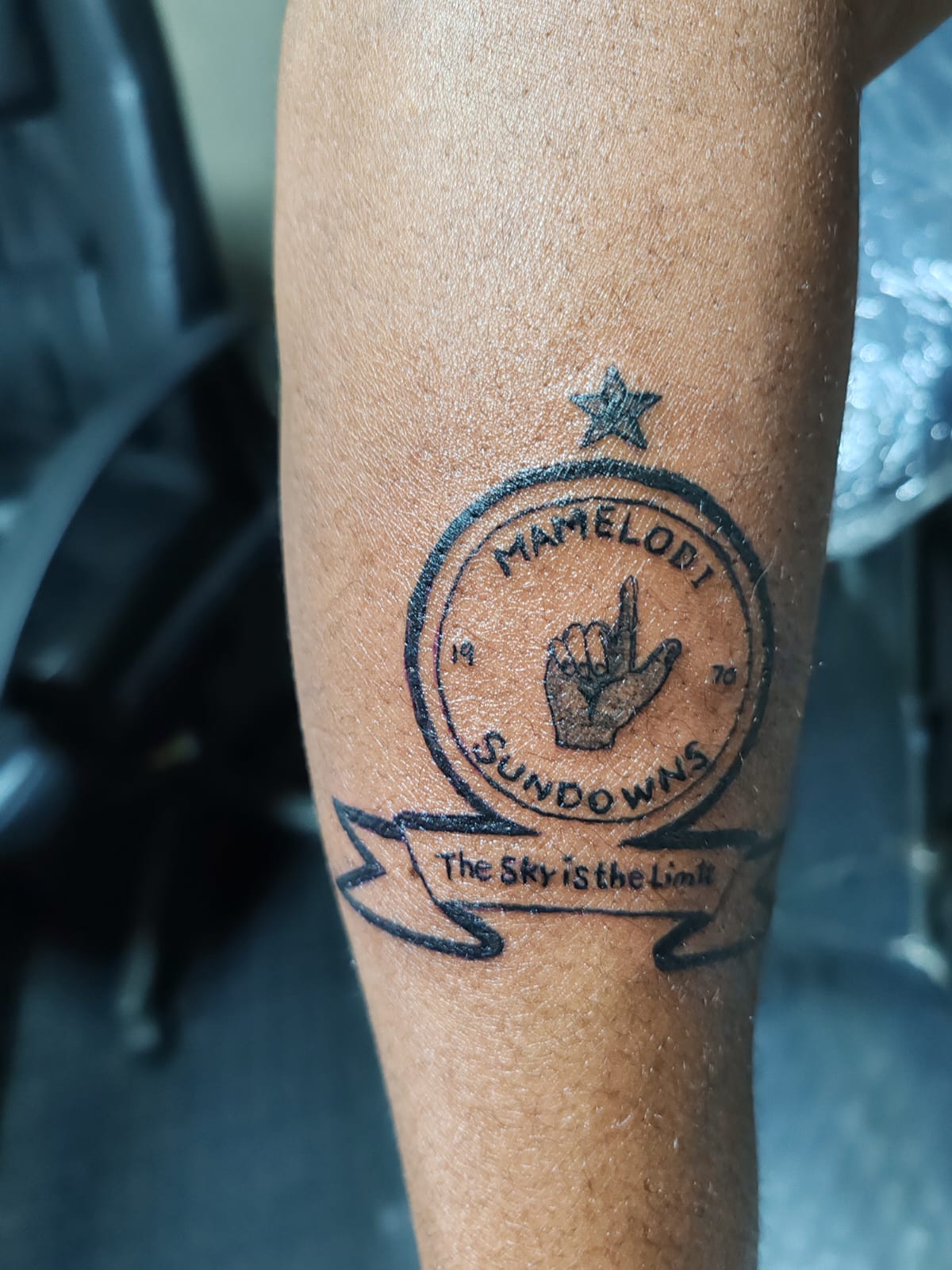 Realistic portrait tattoo on an upper arm