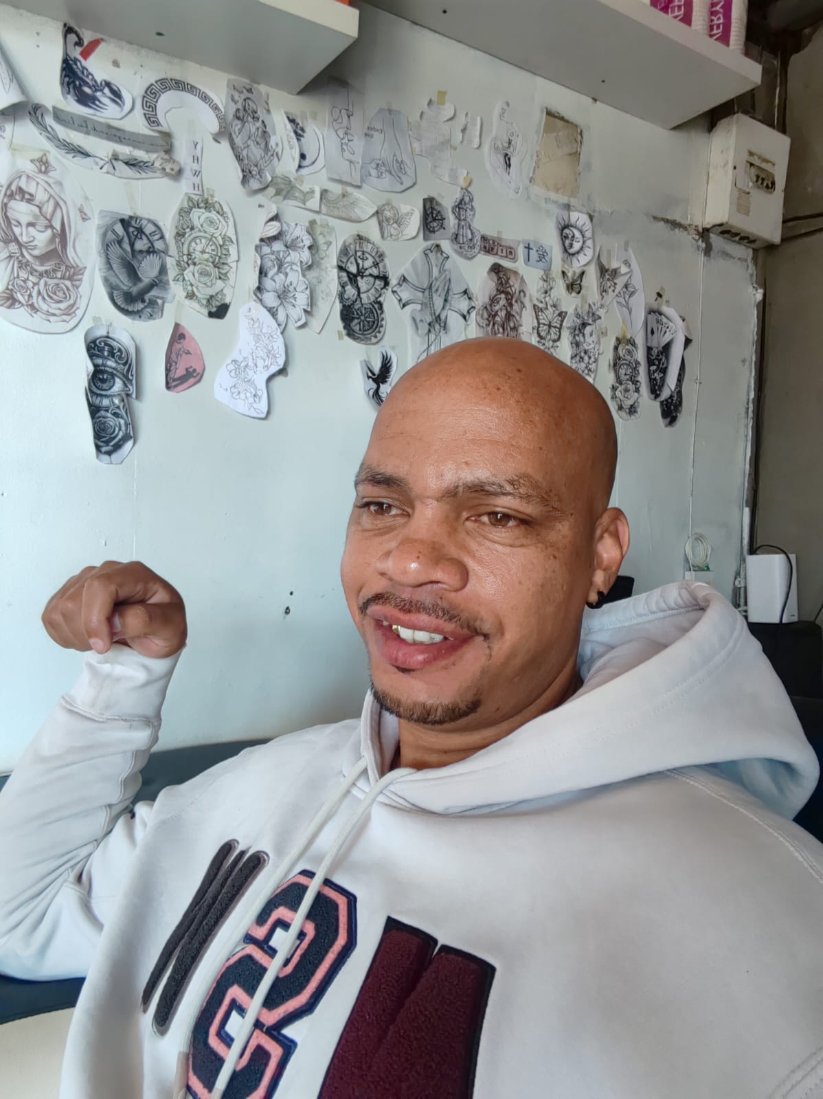 Rabie Ridge Ink House tattoo artist working in the studio